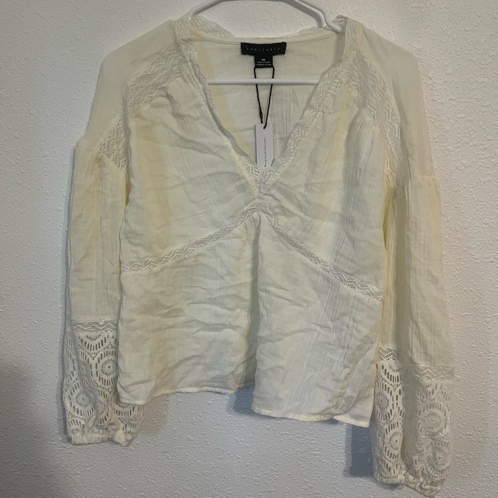 Sanctuary Top size XS. Never worn.